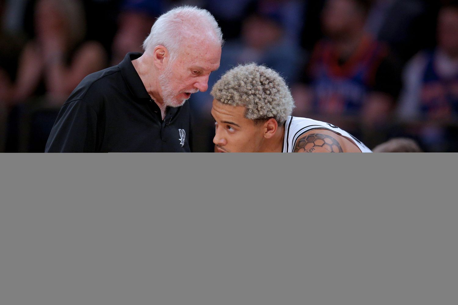 San Antonio Spurs coach Gregg Popovich talks to Jeremy Sochan during the third quarter against the New York Knicks at Madison Square Garden.